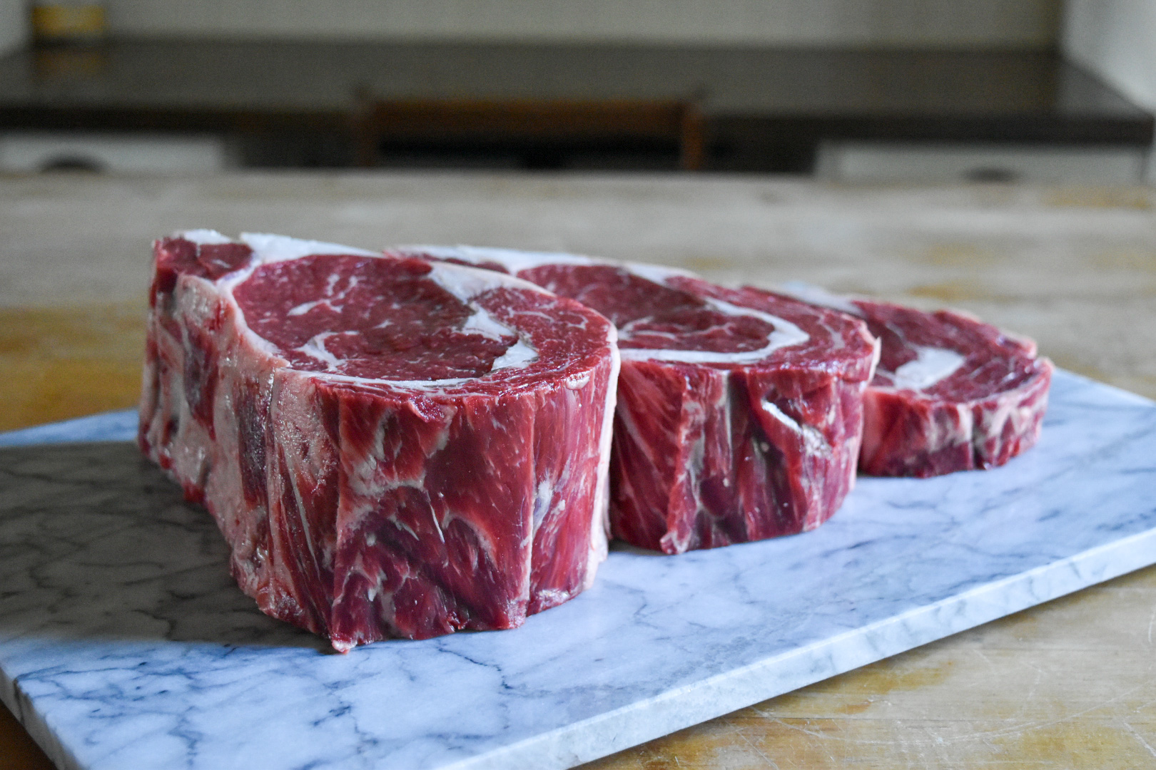 Juicy thick steaks on a platter.