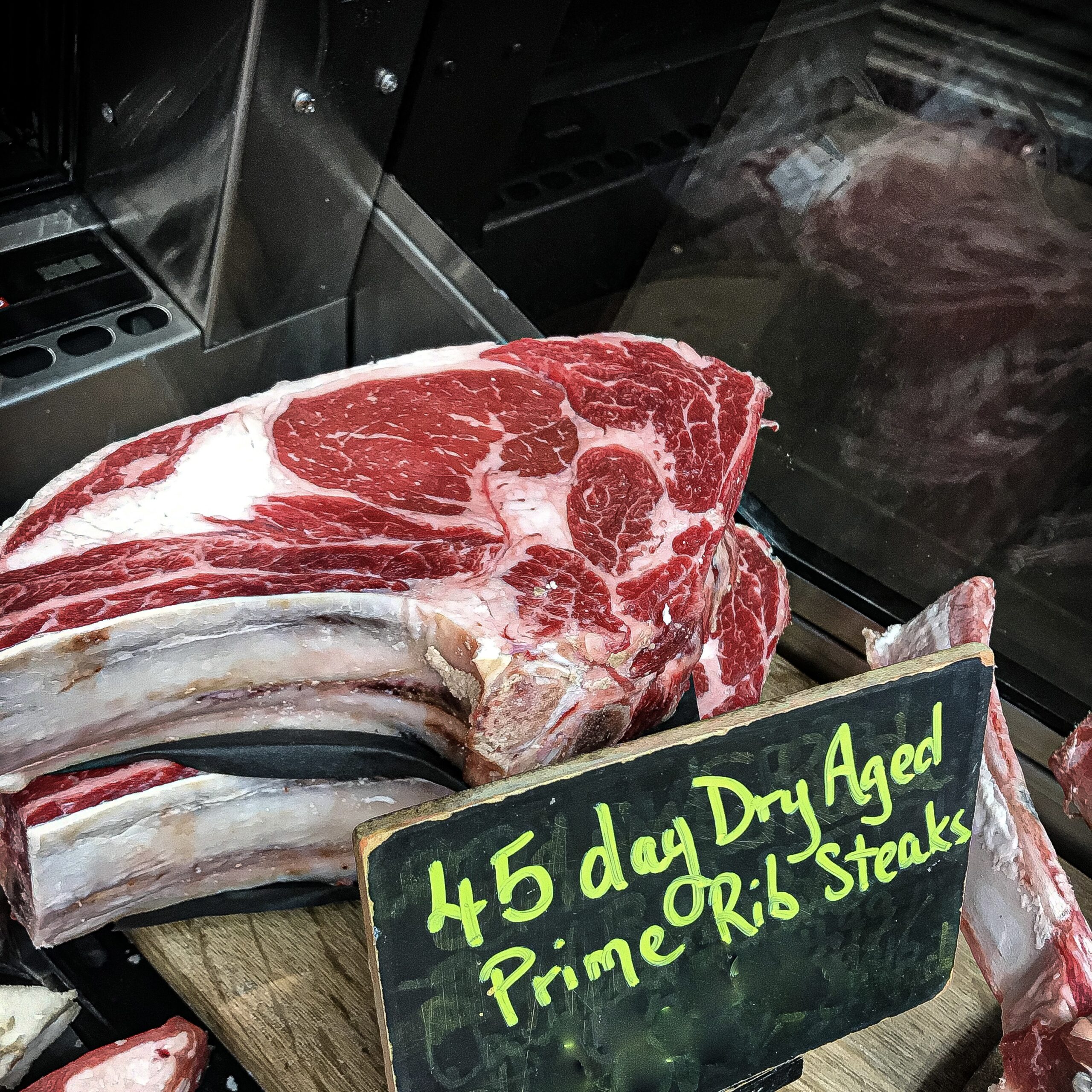 Dry Aged Steaks in a butcher case, close to Orangeville, On