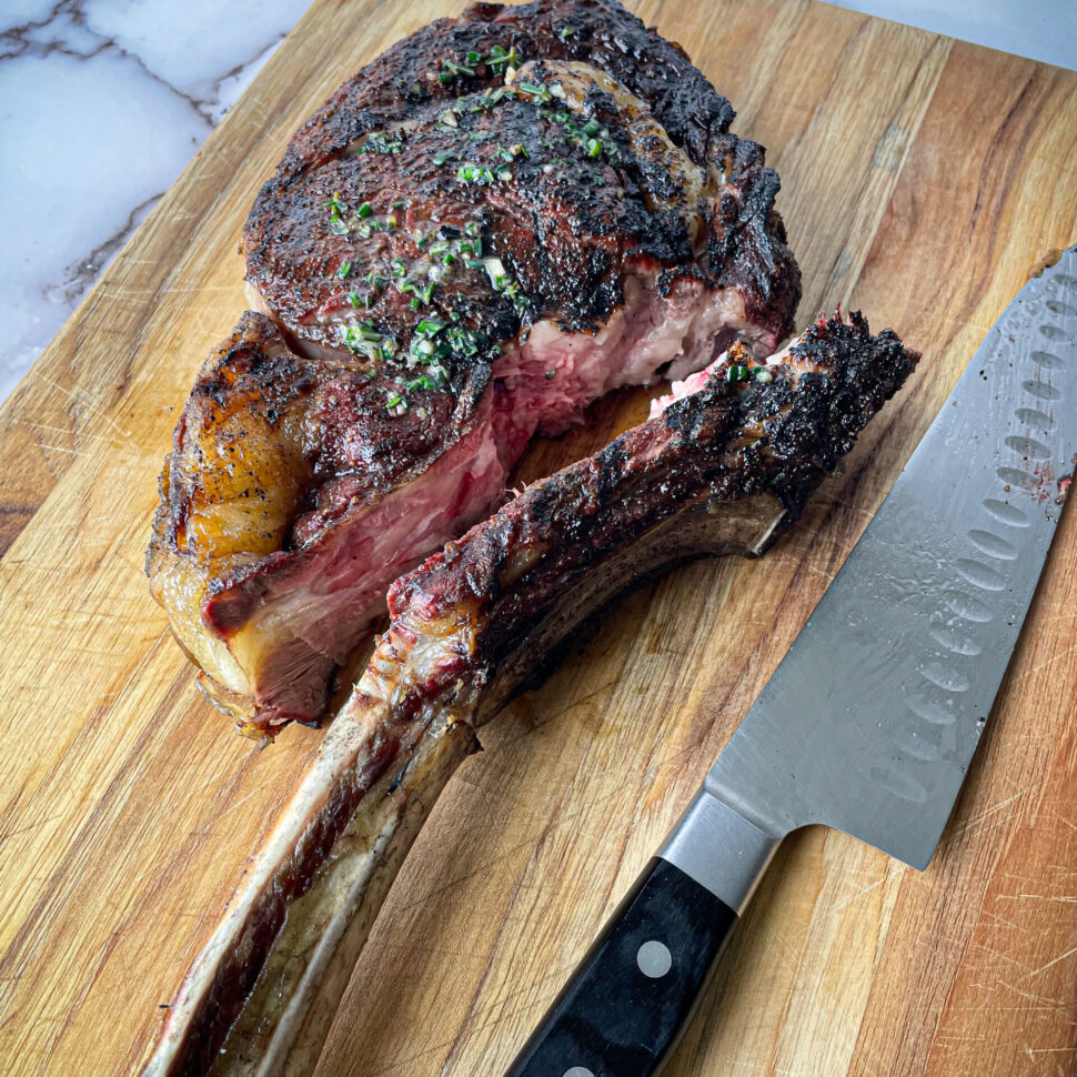 How to cut a Tomahawk Steak. Remove the bone first for easy carving.