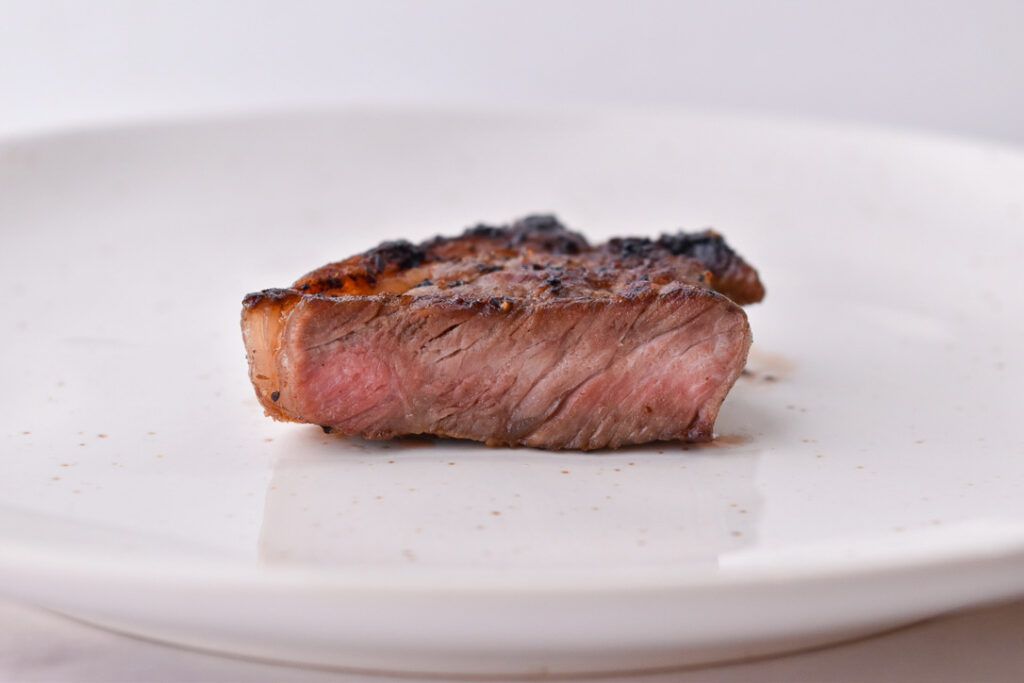 Steak Doneness Levels: Well-done steak pictured at the perfect temperature doneness