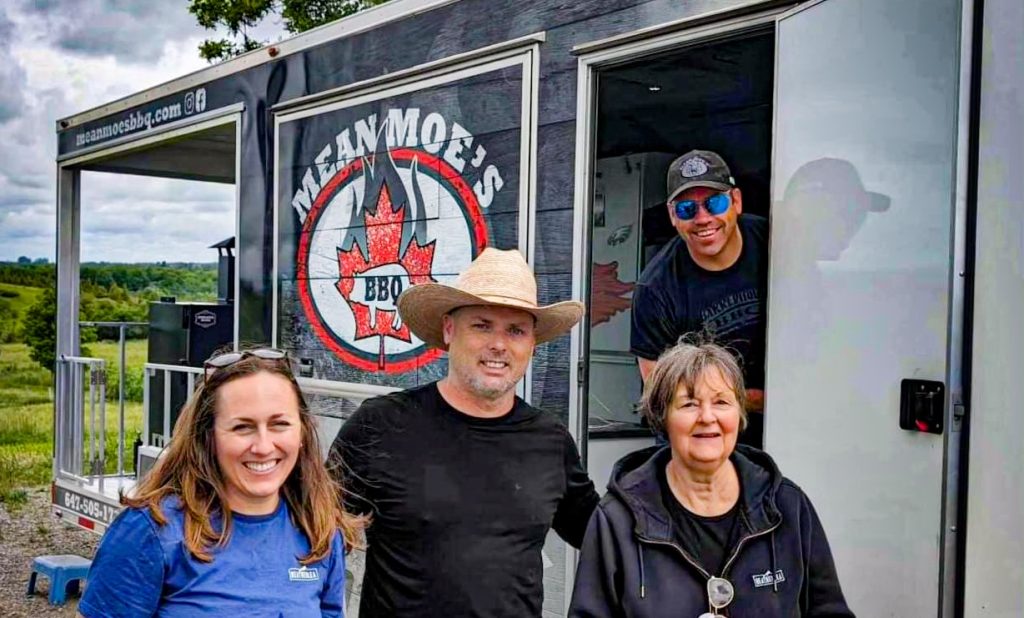 BBQ Competition Team photo with Heatherlea and Mean Moe's BBQ